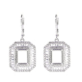 Sterling Silver semi mount earrings with emerald setting, dangle leverback, baguette triple halo, featuring white topaz.